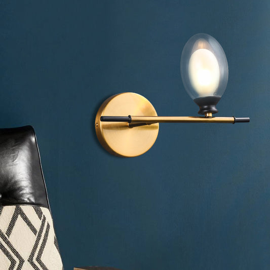 Vintage Oval Wall Sconce 1 Light Clear Glass Bedroom Wall Mounted Lamp with Brass Bar Clearhalo 'Cast Iron' 'Glass' 'Industrial' 'Modern wall lights' 'Modern' 'Tiffany' 'Traditional wall lights' 'Vanity Lights' 'Wall Lights' Lighting' 370364