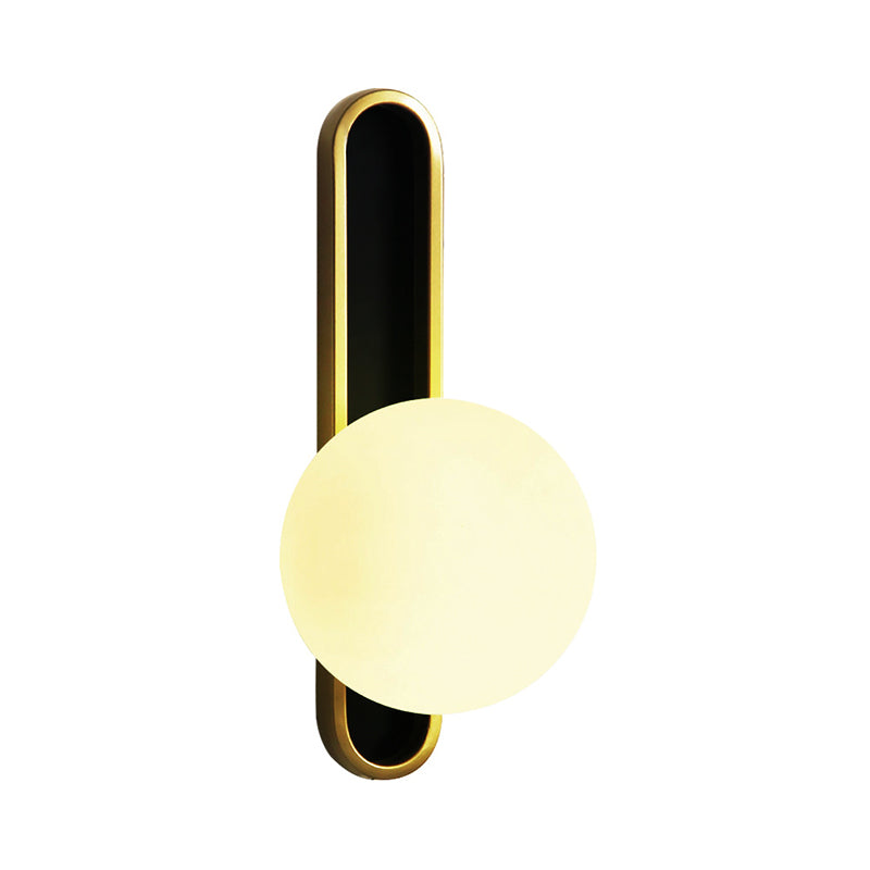 Mid Century Modern Orb Wall Light Clear/Cream Glass Single Light Mini Wall Mount Lighting in Brass Clearhalo 'Cast Iron' 'Glass' 'Industrial' 'Modern wall lights' 'Modern' 'Tiffany' 'Traditional wall lights' 'Wall Lamps & Sconces' 'Wall Lights' Lighting' 379608