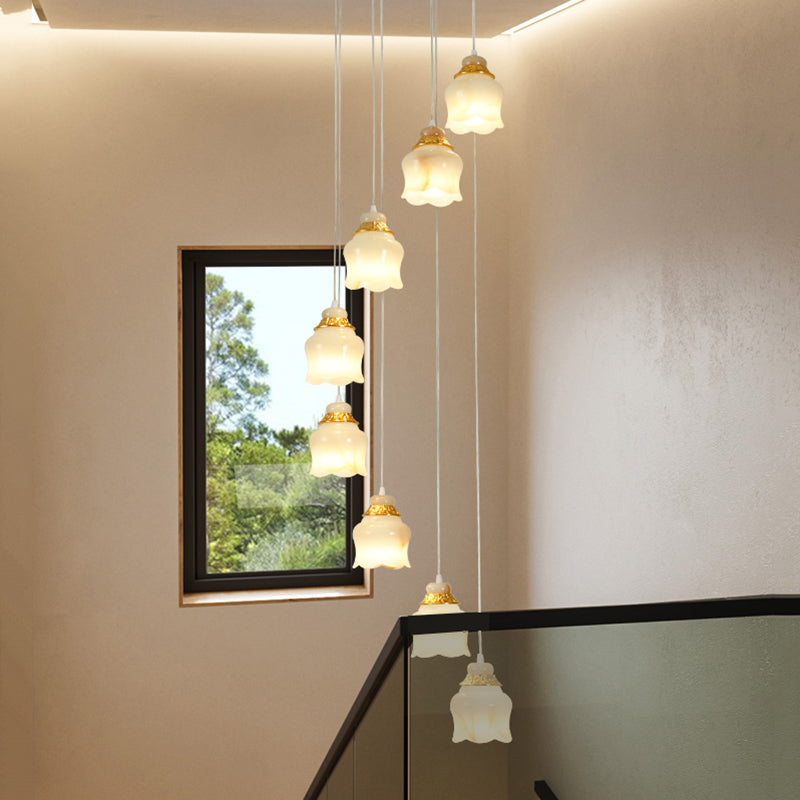 White Glass Floral Cluster Pendant Light Modernism 8 Lights Stair Hanging Lamp in Gold White Clearhalo 'Ceiling Lights' 'Glass shade' 'Glass' 'Modern Pendants' 'Modern' 'Pendant Lights' 'Pendants' Lighting' 393528