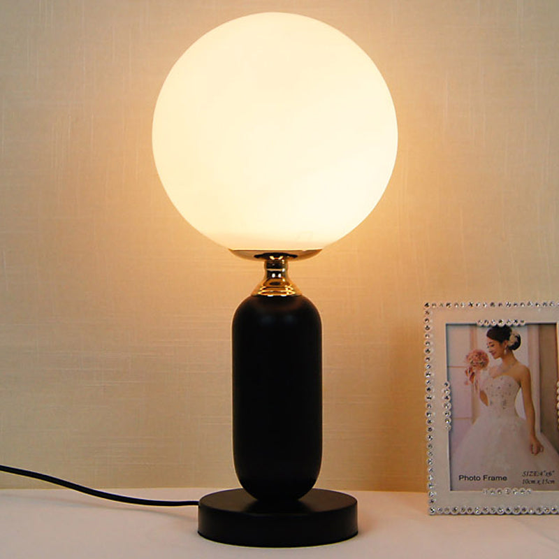 1 Bulb Study Table Lamp Modern Black Reading Book Light with Round White Glass Shade Clearhalo 'Lamps' 'Table Lamps' Lighting' 400439