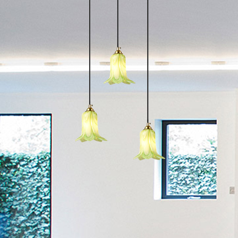 Romantic Pastoral Lily Cluster Pendant 3 Bulbs White/Green/Purple Glass LED Ceiling Hang Fixture for Foyer Green Clearhalo 'Ceiling Lights' 'Chandeliers' 'Glass shade' 'Glass' 'Pendant Lights' 'Pendants' Lighting' 401564