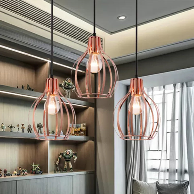 Metallic Rose Gold Pendant Lighting Global Cage Shade 3 Lights Industrial Style Ceiling Light Fixture with Round/Linear Canopy Clearhalo 'Ceiling Lights' 'Modern Pendants' 'Modern' 'Pendant Lights' 'Pendants' Lighting' 439039