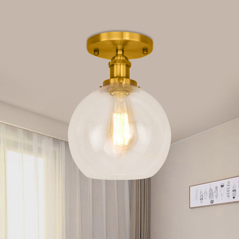 Spherical Balcony Semi Flush Industrial Clear Glass One Light Black/Brass/Copper Ceiling Light Fixture Brass Clearhalo 'Ceiling Lights' 'Close To Ceiling Lights' 'Close to ceiling' 'Glass shade' 'Glass' 'Semi-flushmount' Lighting' 460006