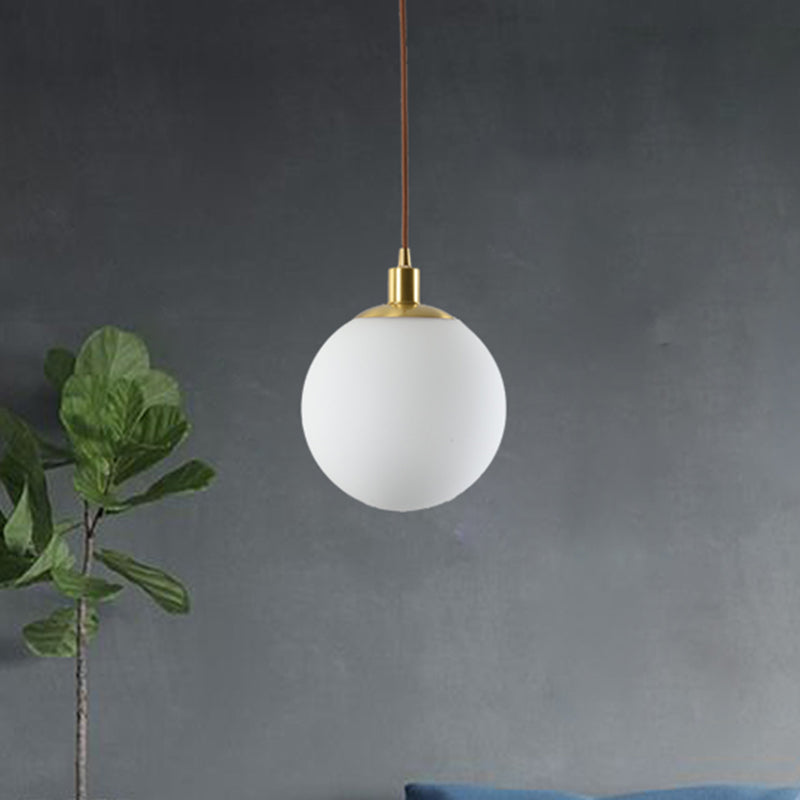 6"/8"/10" Wide Milky Glass Ball Pendant Light Post Modern Led Hanging Ceiling Lamp in Brass Clearhalo 'Ceiling Lights' 'Glass shade' 'Glass' 'Modern Pendants' 'Modern' 'Pendant Lights' 'Pendants' Lighting' 460227