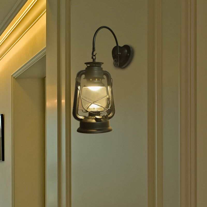 Coastal Lantern Wall Lighting Fixture 1 Bulb Clear Glass Sconce Light in Black/Bronze/Copper for Corridor Clearhalo 'Art deco wall lights' 'Cast Iron' 'Glass' 'Industrial wall lights' 'Industrial' 'Middle century wall lights' 'Modern' 'Rustic wall lights' 'Tiffany' 'Traditional wall lights' 'Wall Lamps & Sconces' 'Wall Lights' Lighting' 460709