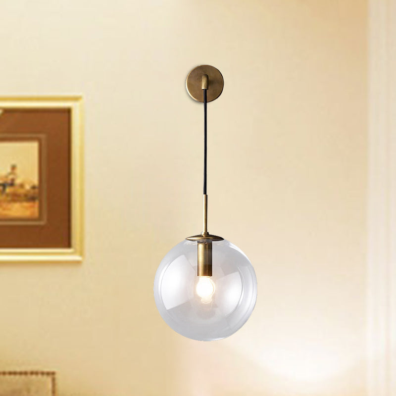 Round Clear Glass Wall Mounted Lamp Industrial Single Bulb Bedroom Vanity Sconce in Chrome/Brass/Black, 6"/8" Wide Clearhalo 'Cast Iron' 'Glass' 'Industrial' 'Modern wall lights' 'Modern' 'Tiffany' 'Traditional wall lights' 'Wall Lamps & Sconces' 'Wall Lights' Lighting' 467747
