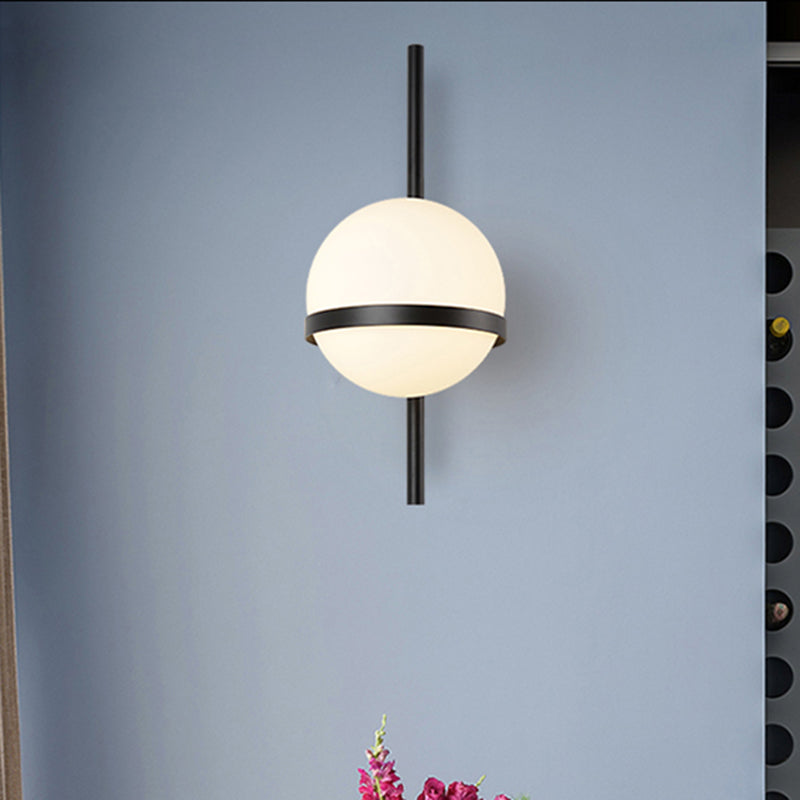 Black/Gold Vertical Wall Sconce Fixture Modern 1 Head Metal Wall Lamp with Orbit Opal Glass Shade, 6"/8" Width Clearhalo 'Cast Iron' 'Glass' 'Industrial' 'Modern wall lights' 'Modern' 'Tiffany' 'Traditional wall lights' 'Wall Lamps & Sconces' 'Wall Lights' Lighting' 493650