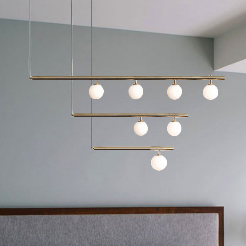 Linear Office Hallway Chandelier with Orbit Shade Metal 3/6/7 Lights Simple Modern Pendant Light in Brass Clearhalo 'Ceiling Lights' 'Chandeliers' 'Modern Chandeliers' 'Modern' Lighting' 494298