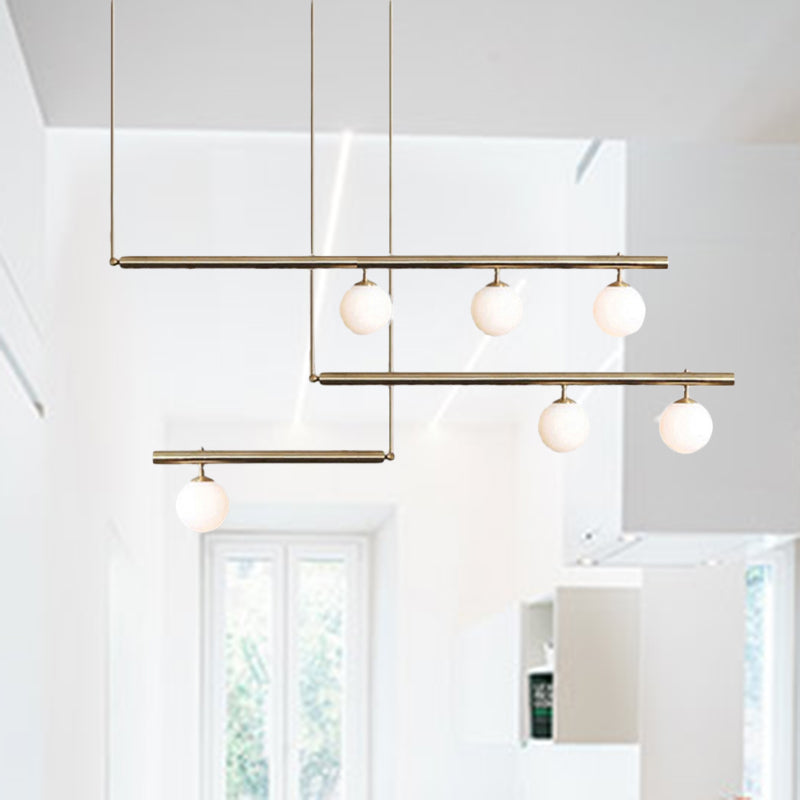 Linear Office Hallway Chandelier with Orbit Shade Metal 3/6/7 Lights Simple Modern Pendant Light in Brass Clearhalo 'Ceiling Lights' 'Chandeliers' 'Modern Chandeliers' 'Modern' Lighting' 494300