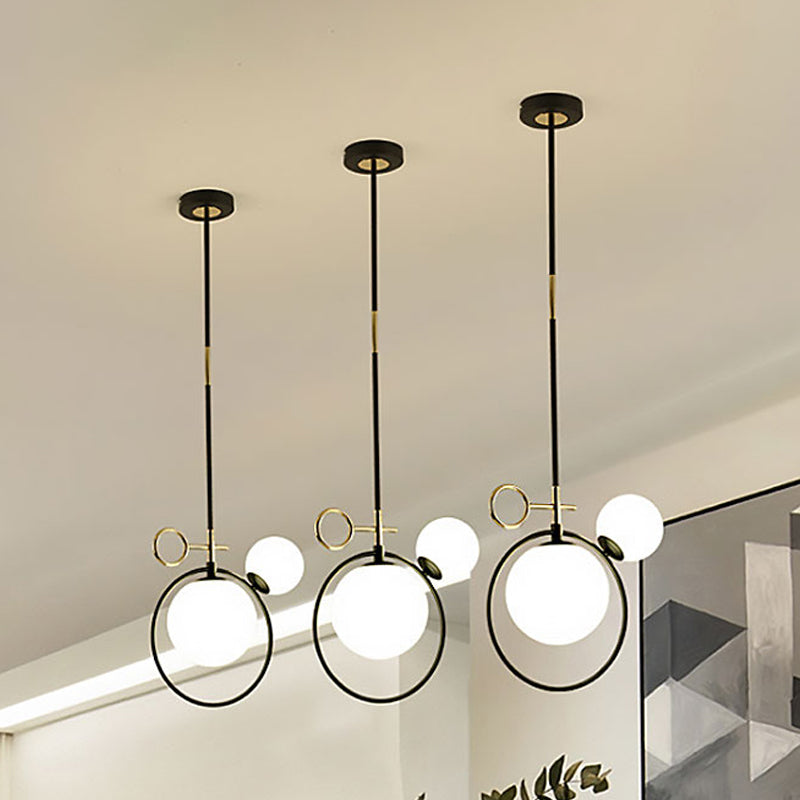 Globe Glass Cluster Pendant Contemporary 2 Lights Black Led Hanging Light Fixture for Living Room Black A Clearhalo 'Ceiling Lights' 'Glass shade' 'Glass' 'Modern Pendants' 'Modern' 'Pendant Lights' 'Pendants' Lighting' 494483