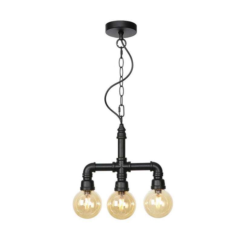 Ball Amber Glass Pendant Light Industrial 3/4 Lights Restaurant LED Ceiling Chandelier in Black with Pipe Arm Clearhalo 'Ceiling Lights' 'Chandeliers' 'Glass shade' 'Glass' 'Industrial Chandeliers' 'Industrial' 'Middle Century Chandeliers' 'Pendant Lights' 'Tiffany' Lighting' 511157