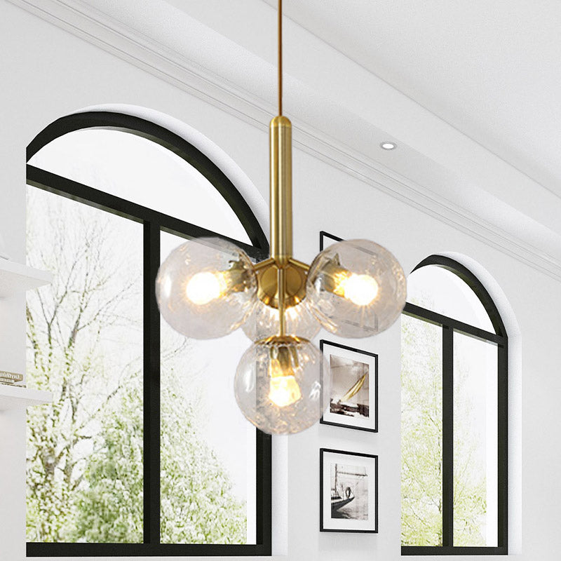 Globe Ceiling Chandelier Modernist Clear Water Glass 4 Heads Gold Pendant Light Fixture Clearhalo 'Ceiling Lights' 'Chandeliers' 'Glass shade' 'Glass' 'Modern Chandeliers' 'Modern' Lighting' 512298