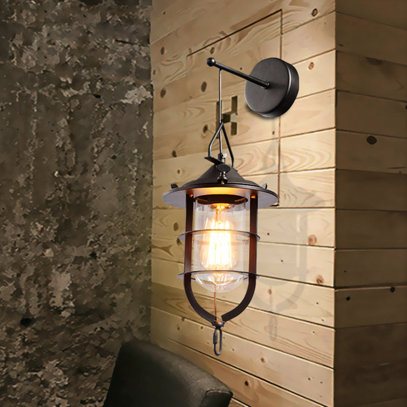 Clear Glass Black Sconce Lamp Capsule 1-Light Traditional Wall Mounted Lighting with Cage Clearhalo 'Art deco wall lights' 'Cast Iron' 'Glass' 'Industrial wall lights' 'Industrial' 'Middle century wall lights' 'Modern' 'Rustic wall lights' 'Tiffany' 'Traditional wall lights' 'Wall Lamps & Sconces' 'Wall Lights' Lighting' 512431