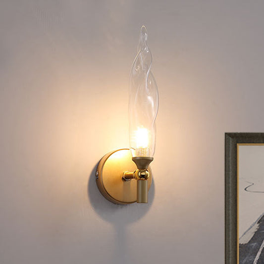 Brass Torch Shape Sconce Lighting Modernist 1 Bulb Clear Glass LED Wall Mount Lamp for Bedside Brass Clearhalo 'Cast Iron' 'Glass' 'Industrial' 'Modern wall lights' 'Modern' 'Tiffany' 'Traditional wall lights' 'Wall Lamps & Sconces' 'Wall Lights' Lighting' 512819