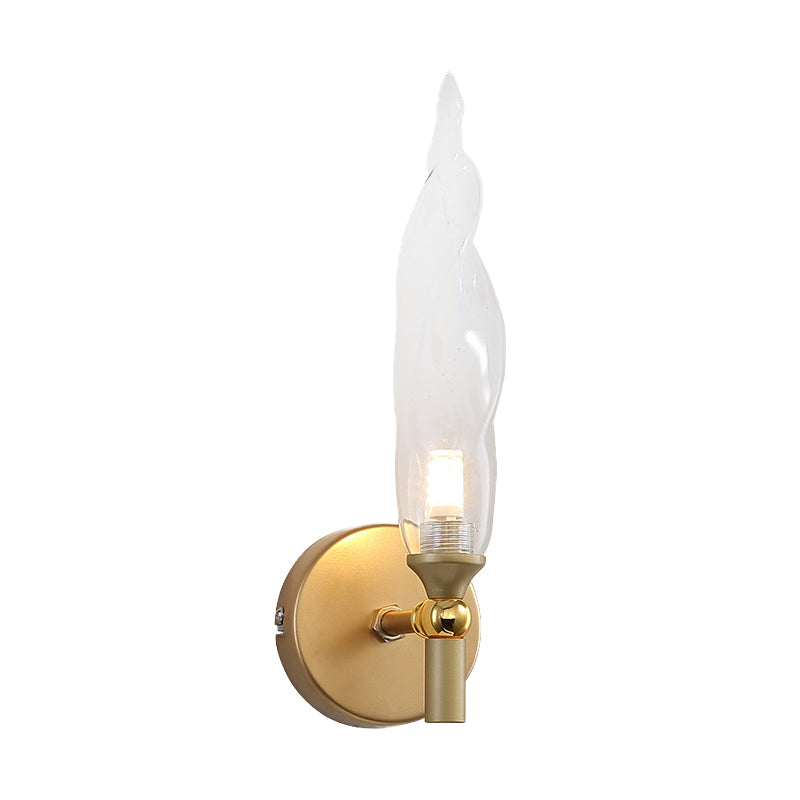 Brass Torch Shape Sconce Lighting Modernist 1 Bulb Clear Glass LED Wall Mount Lamp for Bedside Clearhalo 'Cast Iron' 'Glass' 'Industrial' 'Modern wall lights' 'Modern' 'Tiffany' 'Traditional wall lights' 'Wall Lamps & Sconces' 'Wall Lights' Lighting' 512821