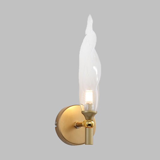 Brass Torch Shape Sconce Lighting Modernist 1 Bulb Clear Glass LED Wall Mount Lamp for Bedside Clearhalo 'Cast Iron' 'Glass' 'Industrial' 'Modern wall lights' 'Modern' 'Tiffany' 'Traditional wall lights' 'Wall Lamps & Sconces' 'Wall Lights' Lighting' 512822