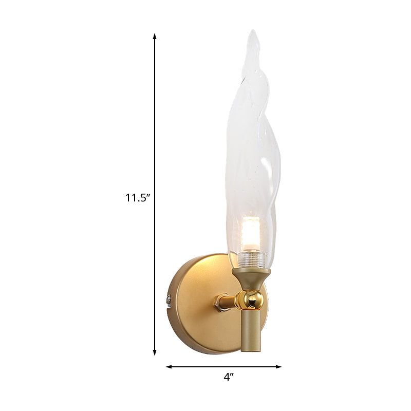 Brass Torch Shape Sconce Lighting Modernist 1 Bulb Clear Glass LED Wall Mount Lamp for Bedside Clearhalo 'Cast Iron' 'Glass' 'Industrial' 'Modern wall lights' 'Modern' 'Tiffany' 'Traditional wall lights' 'Wall Lamps & Sconces' 'Wall Lights' Lighting' 512823