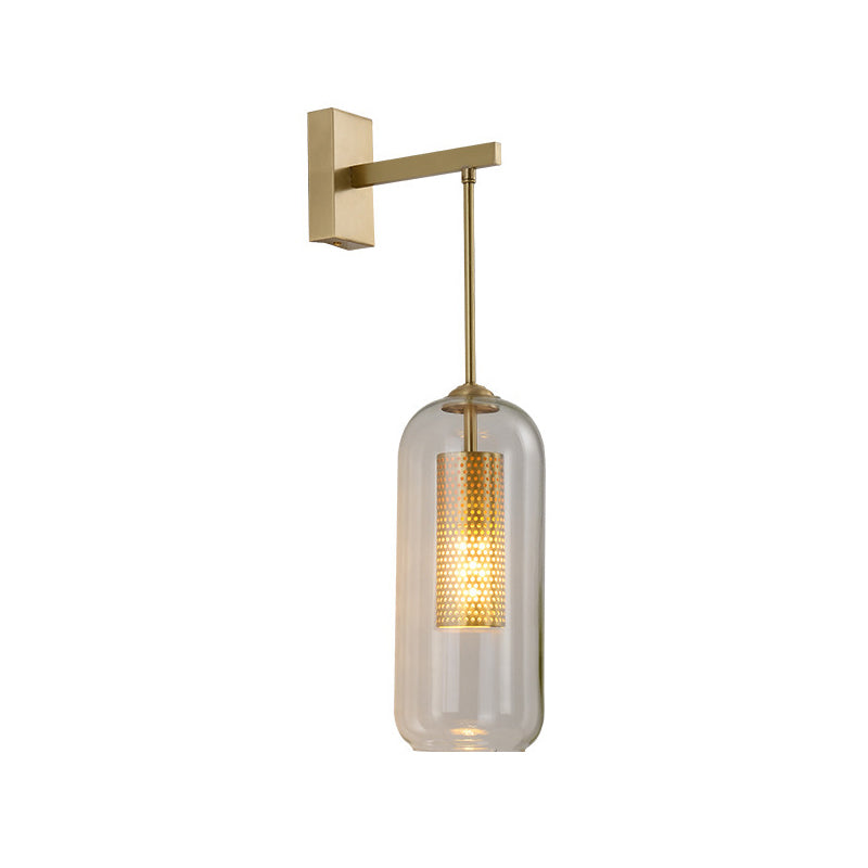 Clear Glass Capsule Wall Mount Light Fixture Modern 1-Head Sconce Lamp in Gold for Bedside Clearhalo 'Cast Iron' 'Glass' 'Industrial' 'Modern wall lights' 'Modern' 'Tiffany' 'Traditional wall lights' 'Wall Lamps & Sconces' 'Wall Lights' Lighting' 512909