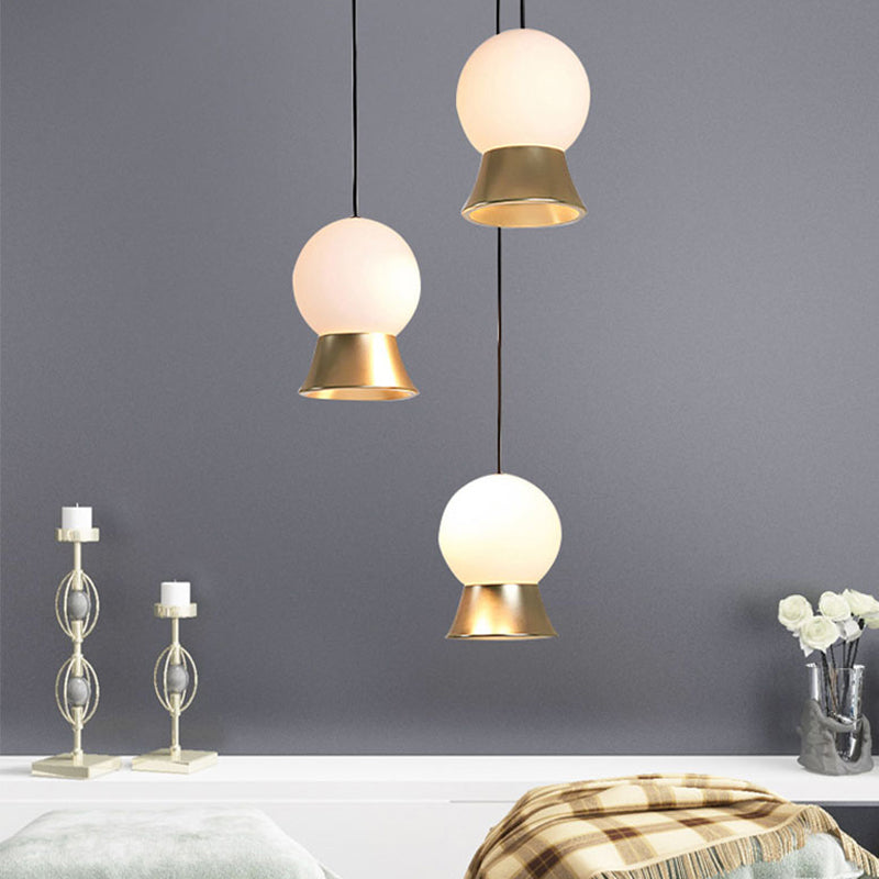 White Glass Globe Hanging Light Kit Postmodern 1 Light Pendant Light with Gold/Black Metal Shade Clearhalo 'Ceiling Lights' 'Glass shade' 'Glass' 'Modern Pendants' 'Modern' 'Pendant Lights' 'Pendants' Lighting' 512932