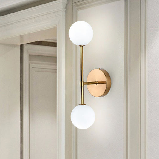Orb White Glass Sconce Lighting Modernist 2 Bulbs Black/Gold Finish Wall Mounted Lamp Fixture for Living Room Gold Clearhalo 'Cast Iron' 'Glass' 'Industrial' 'Modern wall lights' 'Modern' 'Tiffany' 'Traditional wall lights' 'Wall Lamps & Sconces' 'Wall Lights' Lighting' 512946