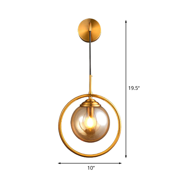 Metal Ring Sconce Lighting Modern 1-Bulb Brass Wall Mounted Lamp with Sphere Tan Glass Shade for Bedside Clearhalo 'Cast Iron' 'Glass' 'Industrial' 'Modern wall lights' 'Modern' 'Tiffany' 'Traditional wall lights' 'Wall Lamps & Sconces' 'Wall Lights' Lighting' 513013