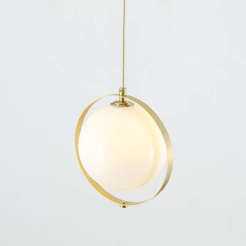 Globe White Glass Hanging Light Kit Modern 1 Light Pendant Lighting with Brass Ring Clearhalo 'Ceiling Lights' 'Glass shade' 'Glass' 'Modern Pendants' 'Modern' 'Pendant Lights' 'Pendants' Lighting' 513146