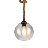 8"/10" Wide Globe Pendant Lighting Industrial 1 Light Clear/Amber Glass Hanging Lamp in Black Clearhalo 'Ceiling Lights' 'Glass shade' 'Glass' 'Modern Pendants' 'Modern' 'Pendant Lights' 'Pendants' Lighting' 513288