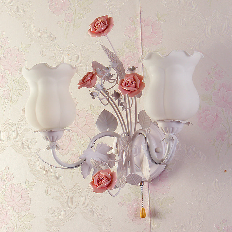 Curvy Arm Bedroom Sconce Light Pastoral Metal 2 Heads Yellow/Pink/Blue Flower Wall Lighting Fixture Pink Clearhalo 'Wall Lamps & Sconces' 'Wall Lights' Lighting' 519621