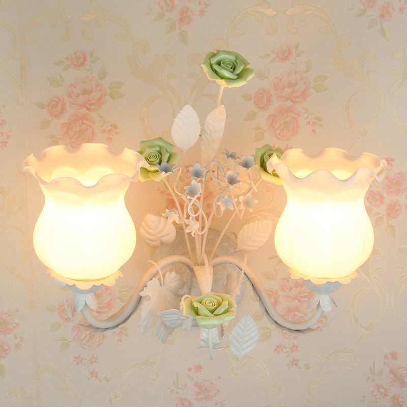 Curvy Arm Bedroom Sconce Light Pastoral Metal 2 Heads Yellow/Pink/Blue Flower Wall Lighting Fixture Green Clearhalo 'Wall Lamps & Sconces' 'Wall Lights' Lighting' 519629