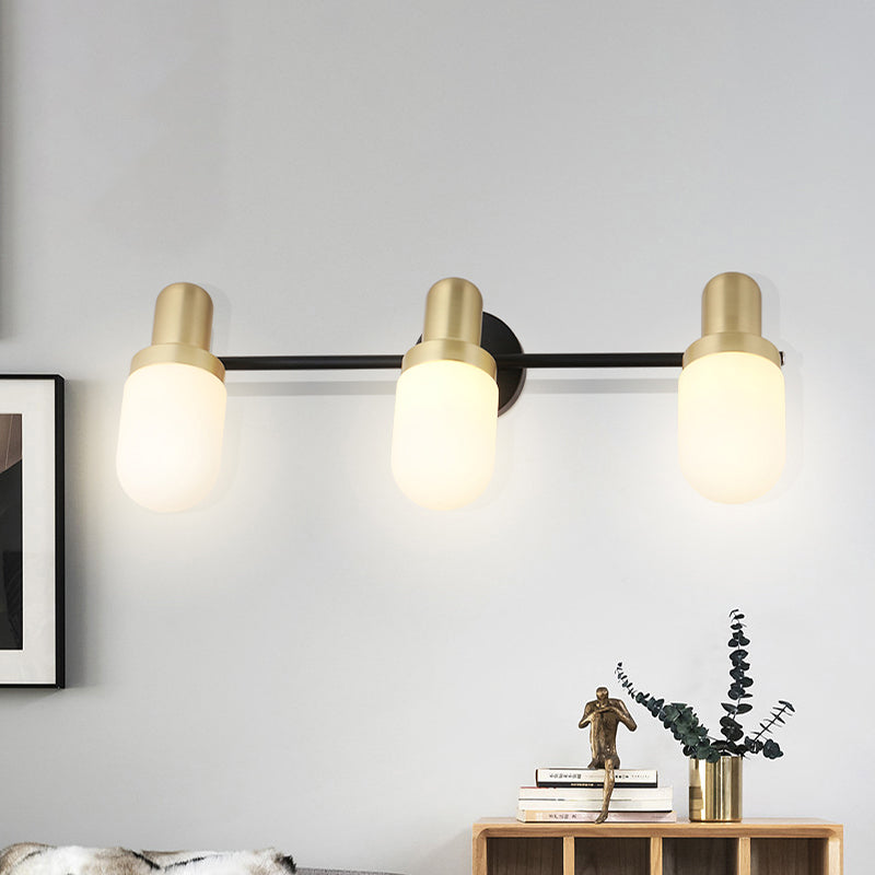 Modern Capsule Glass Sconce Light 1/2/3 Lights Wall Mount Light with Black Arm and Backplate Clearhalo 'Cast Iron' 'Glass' 'Industrial' 'Modern wall lights' 'Modern' 'Tiffany' 'Traditional wall lights' 'Wall Lamps & Sconces' 'Wall Lights' Lighting' 519882