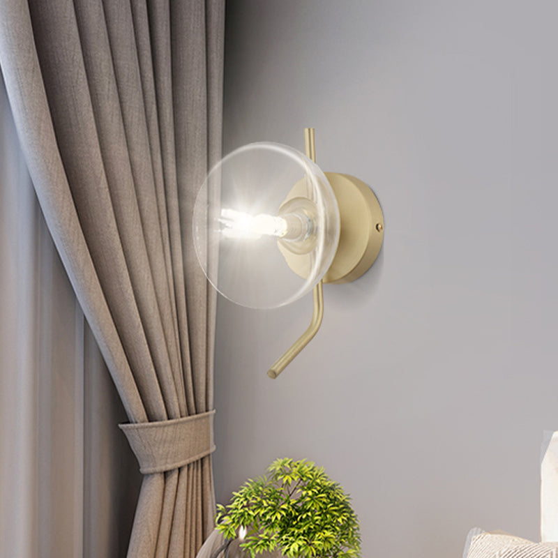 Clear Glass Dome Wall Mounted Light Postmodern 1 Light Sconce Light with Gold Arm Clearhalo 'Cast Iron' 'Glass' 'Industrial' 'Modern wall lights' 'Modern' 'Tiffany' 'Traditional wall lights' 'Wall Lamps & Sconces' 'Wall Lights' Lighting' 519887
