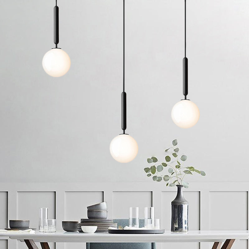 Contemporary 3 Bulbs Suspension Light with Cream Glass Shade Black Orb Multi Lamp Pendant Black Clearhalo 'Ceiling Lights' 'Glass shade' 'Glass' 'Modern Pendants' 'Modern' 'Pendant Lights' 'Pendants' Lighting' 520137