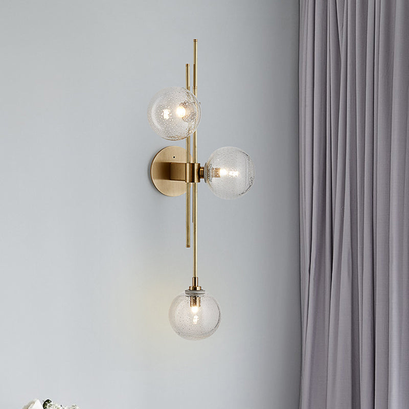 Green/Clear Glass Globe Wall Sconce Lamp Contemporary 3 Lights Wall Light Fixture in Brass Clearhalo 'Cast Iron' 'Glass' 'Industrial' 'Modern wall lights' 'Modern' 'Tiffany' 'Traditional wall lights' 'Wall Lamps & Sconces' 'Wall Lights' Lighting' 520461