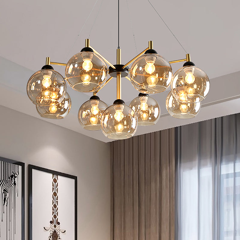 Post-Modern Globe Chandelier Lighting Amber Glass 9 Bulbs Living Room Ceiling Hang Fixture in Brass Brass Clearhalo 'Ceiling Lights' 'Chandeliers' 'Glass shade' 'Glass' 'Modern Chandeliers' 'Modern' Lighting' 520503