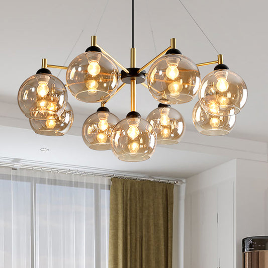 Post-Modern Globe Chandelier Lighting Amber Glass 9 Bulbs Living Room Ceiling Hang Fixture in Brass Clearhalo 'Ceiling Lights' 'Chandeliers' 'Glass shade' 'Glass' 'Modern Chandeliers' 'Modern' Lighting' 520504