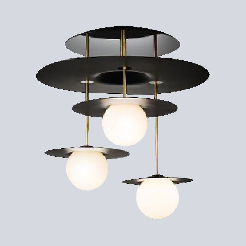Metal Disk Flush Light Fixture Modernist 3 Bulbs Black Semi Flush Mount Ceiling Lamp with Ball White Glass Shade Clearhalo 'Ceiling Lights' 'Close To Ceiling Lights' 'Close to ceiling' 'Glass shade' 'Glass' 'Semi-flushmount' Lighting' 520598