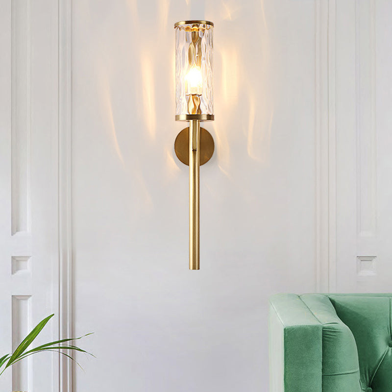 Modernist Cylinder Sconce Light Fixture Clear Water Glass 1 Light Corner Wall Lamp in Brass with Pencil Arm Clearhalo 'Cast Iron' 'Glass' 'Industrial' 'Modern wall lights' 'Modern' 'Tiffany' 'Traditional wall lights' 'Wall Lamps & Sconces' 'Wall Lights' Lighting' 520682