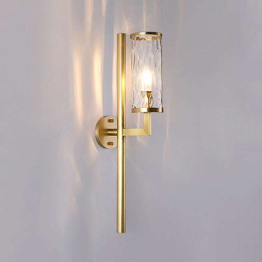 Modernist Cylinder Sconce Light Fixture Clear Water Glass 1 Light Corner Wall Lamp in Brass with Pencil Arm Clearhalo 'Cast Iron' 'Glass' 'Industrial' 'Modern wall lights' 'Modern' 'Tiffany' 'Traditional wall lights' 'Wall Lamps & Sconces' 'Wall Lights' Lighting' 520684