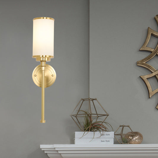 Post Modern Cylindrical Wall Light Sconce Milky Glass 1-Head Living Room Wall Mounted Lamp in Gold with Straight Arm Gold Clearhalo 'Cast Iron' 'Glass' 'Industrial' 'Modern wall lights' 'Modern' 'Tiffany' 'Traditional wall lights' 'Wall Lamps & Sconces' 'Wall Lights' Lighting' 520711