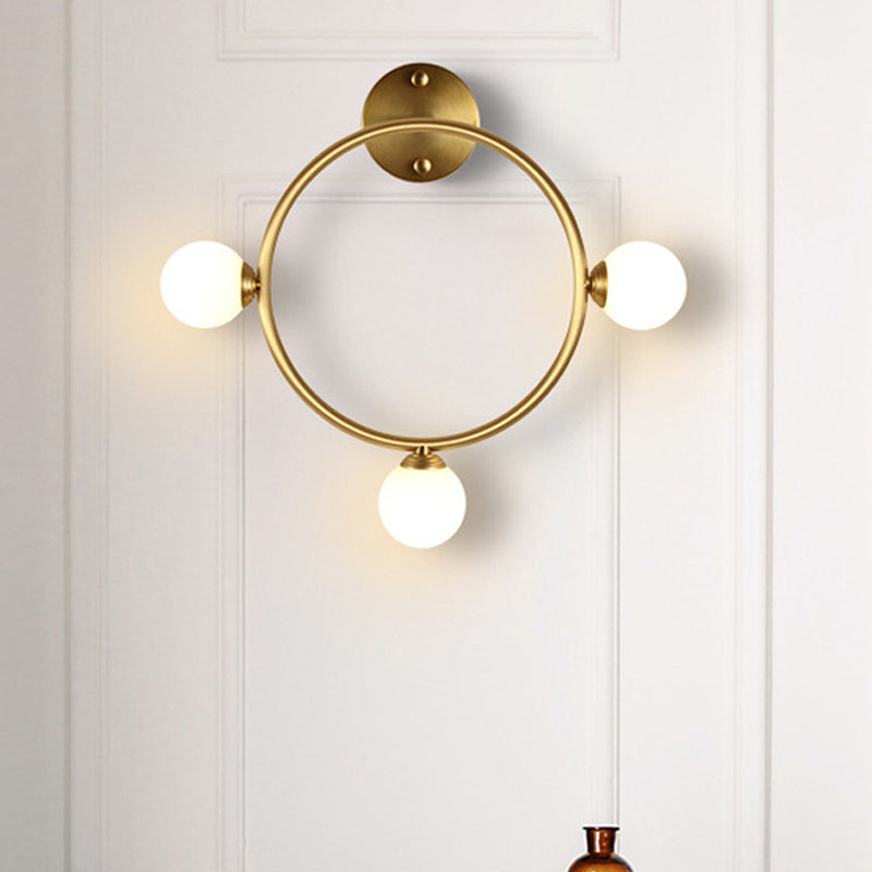 Metallic Ring Wall Mount Sconce Post-Modern 3 Lights LED Wall Lamp Fixture in Brass for Bedside Brass Clearhalo 'Cast Iron' 'Glass' 'Industrial' 'Modern wall lights' 'Modern' 'Tiffany' 'Traditional wall lights' 'Wall Lamps & Sconces' 'Wall Lights' Lighting' 520716