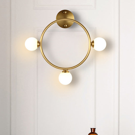 Metallic Ring Wall Mount Sconce Post-Modern 3 Lights LED Wall Lamp Fixture in Brass for Bedside Brass Clearhalo 'Cast Iron' 'Glass' 'Industrial' 'Modern wall lights' 'Modern' 'Tiffany' 'Traditional wall lights' 'Wall Lamps & Sconces' 'Wall Lights' Lighting' 520716