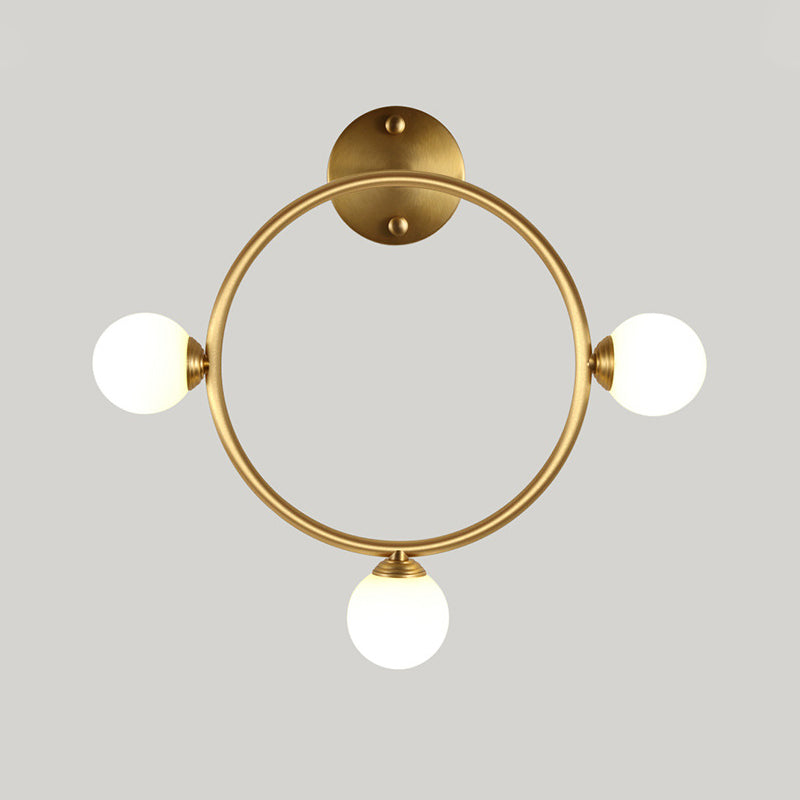 Metallic Ring Wall Mount Sconce Post-Modern 3 Lights LED Wall Lamp Fixture in Brass for Bedside Clearhalo 'Cast Iron' 'Glass' 'Industrial' 'Modern wall lights' 'Modern' 'Tiffany' 'Traditional wall lights' 'Wall Lamps & Sconces' 'Wall Lights' Lighting' 520719