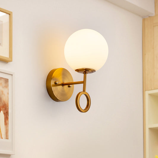Minimalist 1 Light Sconce Lighting with Cream Glass Shade Brass Global Wall Mounted Lamp Brass Clearhalo 'Cast Iron' 'Glass' 'Industrial' 'Modern wall lights' 'Modern' 'Tiffany' 'Traditional wall lights' 'Wall Lamps & Sconces' 'Wall Lights' Lighting' 520721