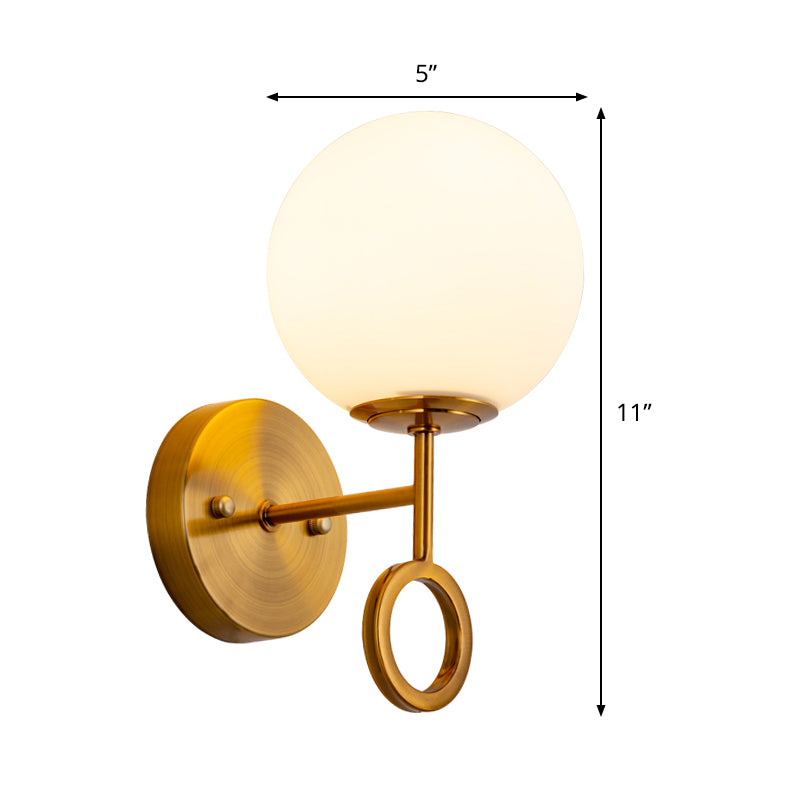 Minimalist 1 Light Sconce Lighting with Cream Glass Shade Brass Global Wall Mounted Lamp Clearhalo 'Cast Iron' 'Glass' 'Industrial' 'Modern wall lights' 'Modern' 'Tiffany' 'Traditional wall lights' 'Wall Lamps & Sconces' 'Wall Lights' Lighting' 520725