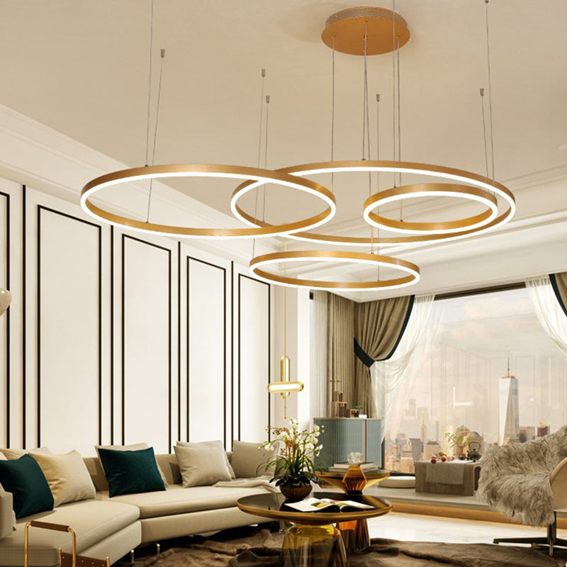 Gold Ring Pendant Chandelier Modern 2/3/4 Lights Acrylic Led Hanging Ceiling Light in White/Warm Light Clearhalo 'Ceiling Lights' 'Chandeliers' 'Modern Chandeliers' 'Modern' Lighting' 520940