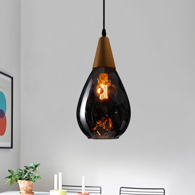 6"/8" Wide Teardrop Pendant Lamp Modernist Style Amber/Clear Dimpled Glass 1 Light Indoor Hanging Light Fixture Clearhalo 'Ceiling Lights' 'Glass shade' 'Glass' 'Modern Pendants' 'Modern' 'Pendant Lights' 'Pendants' Lighting' 599711