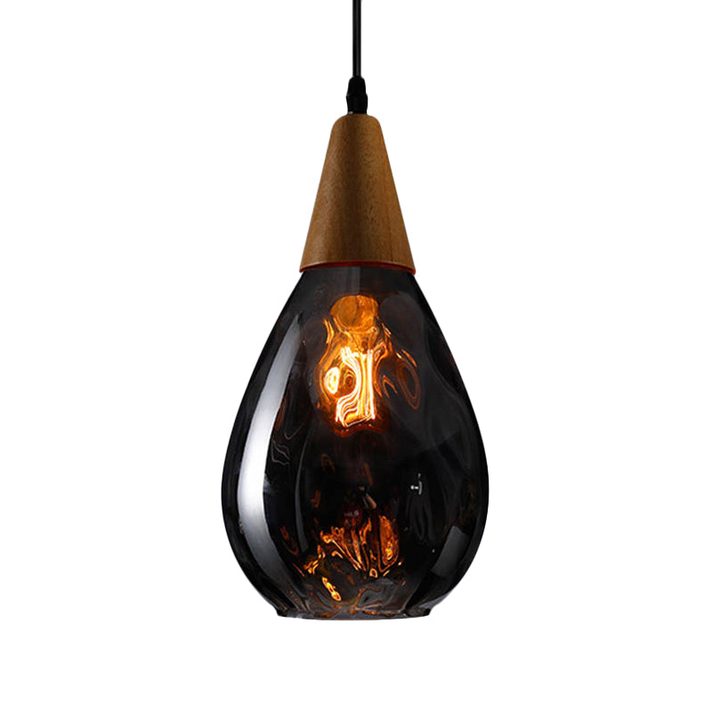 6"/8" Wide Teardrop Pendant Lamp Modernist Style Amber/Clear Dimpled Glass 1 Light Indoor Hanging Light Fixture Clearhalo 'Ceiling Lights' 'Glass shade' 'Glass' 'Modern Pendants' 'Modern' 'Pendant Lights' 'Pendants' Lighting' 599713