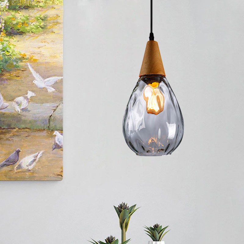 6"/8" Wide Teardrop Pendant Lamp Modernist Style Amber/Clear Dimpled Glass 1 Light Indoor Hanging Light Fixture Clearhalo 'Ceiling Lights' 'Glass shade' 'Glass' 'Modern Pendants' 'Modern' 'Pendant Lights' 'Pendants' Lighting' 599721