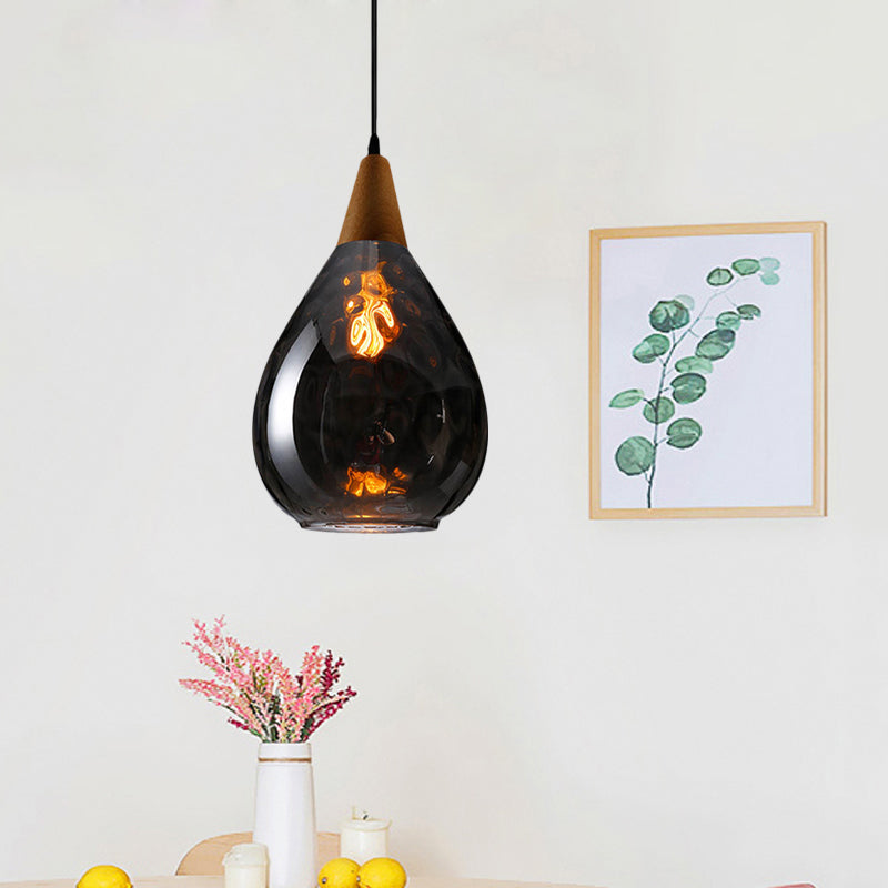 6"/8" Wide Teardrop Pendant Lamp Modernist Style Amber/Clear Dimpled Glass 1 Light Indoor Hanging Light Fixture Clearhalo 'Ceiling Lights' 'Glass shade' 'Glass' 'Modern Pendants' 'Modern' 'Pendant Lights' 'Pendants' Lighting' 599725