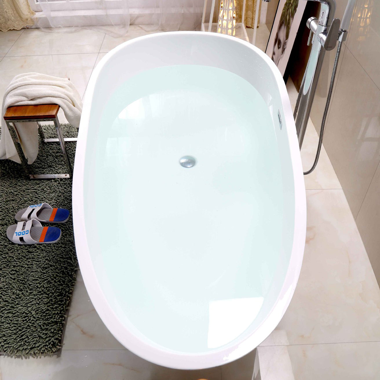 White Acrylic Oval Bathtub Freestanding Soaking Bath Tub with Center Drain Clearhalo 'Bathroom Remodel & Bathroom Fixtures' 'Bathtubs' 'Home Improvement' 'home_improvement' 'home_improvement_bathtubs' 'Showers & Bathtubs' 6124162